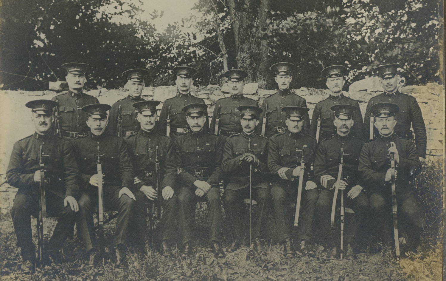 The station party of Castlerea R.I.C. Barracks, a group of uniformed constables, photographed around 1920
